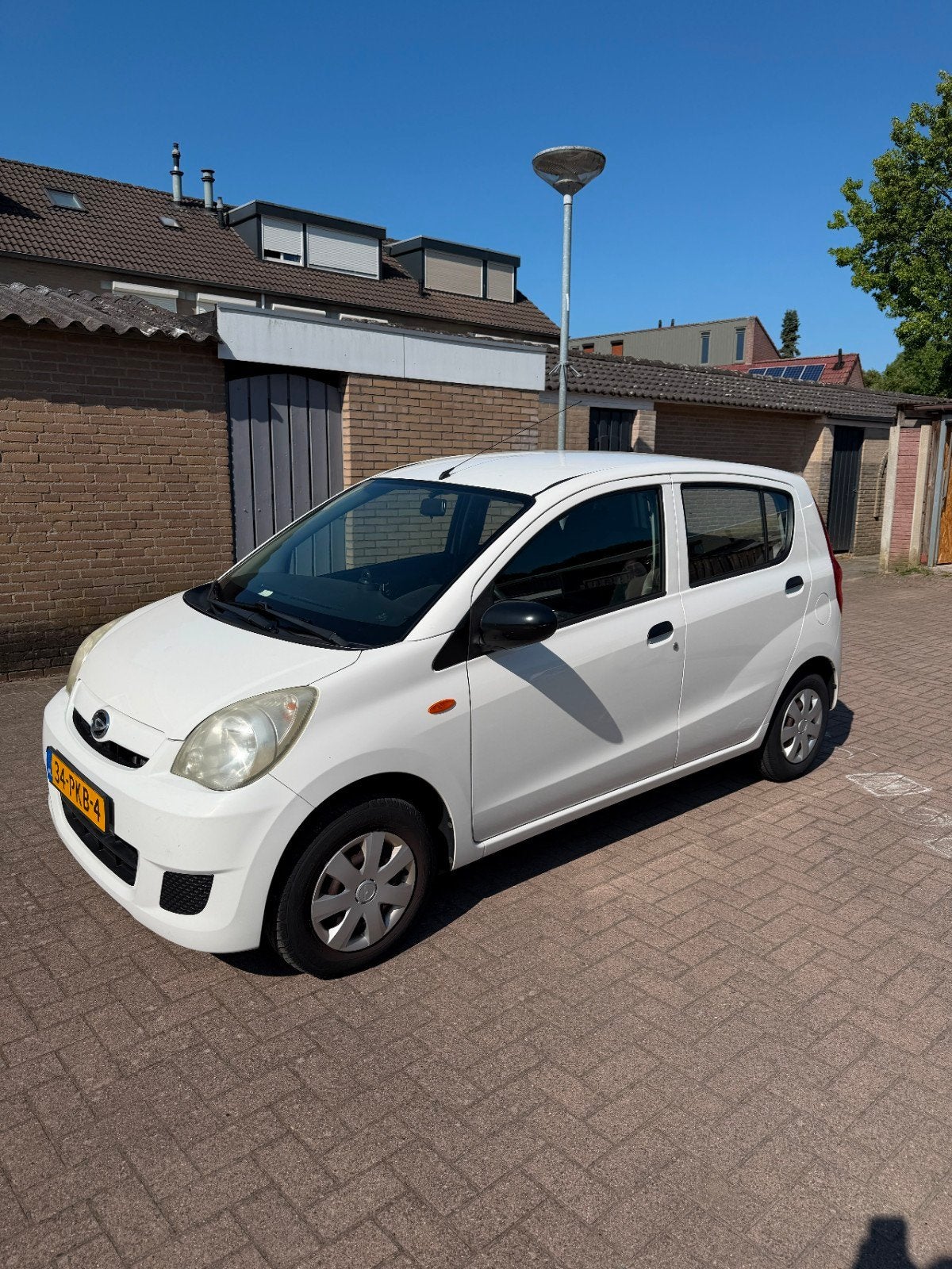 Daihatsu Cuore 1.0 5D 2011 Wit