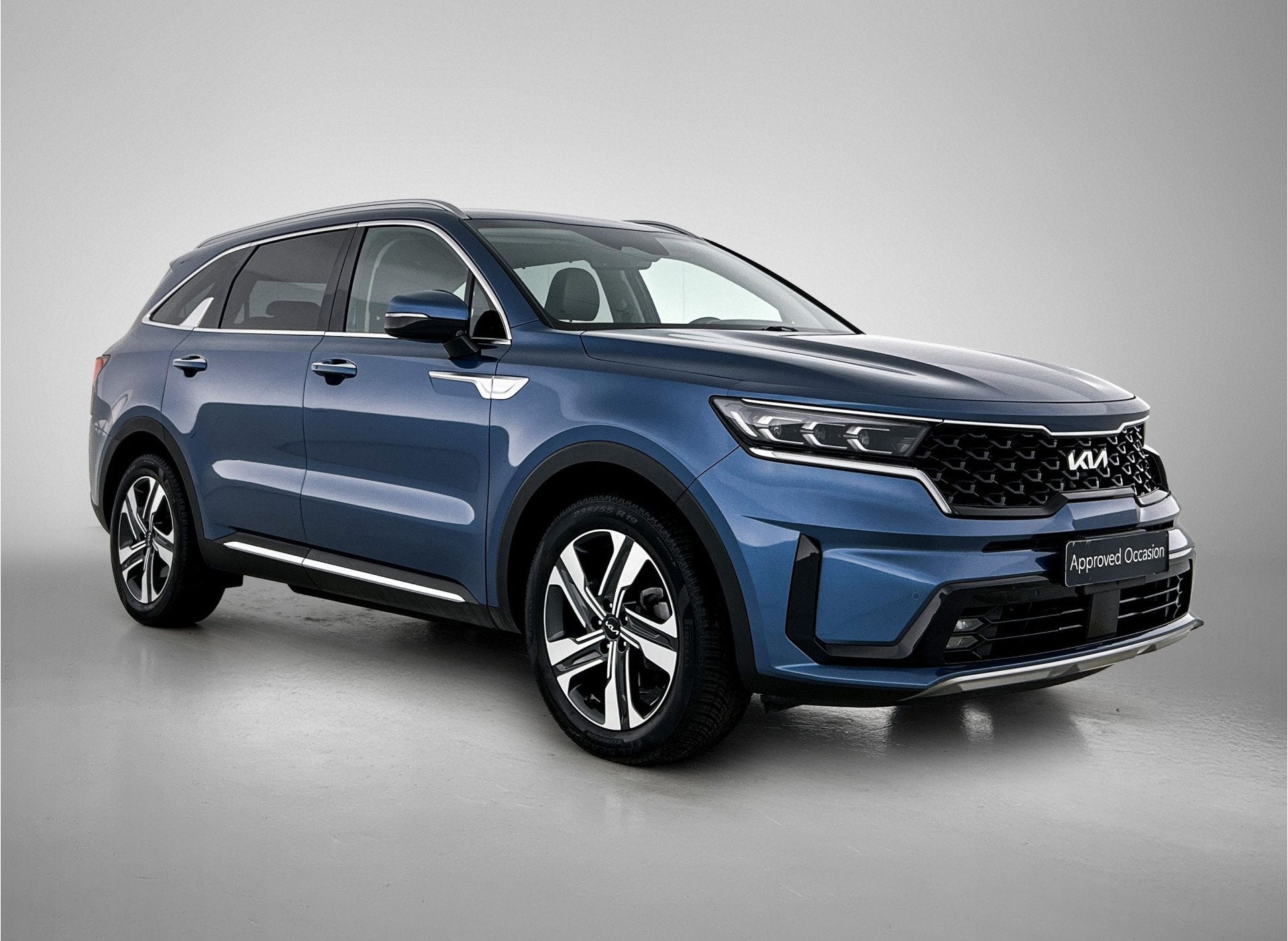Kia Sorento 1.6 T-GDI Hybrid 2WD DynamicPlusLine 7p., Auto's, 12 maanden, Gebruikt, Blauw, Leder