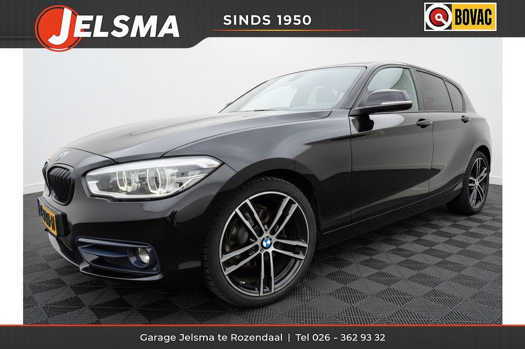 BMW 1-serie 118i Sport Line Aut., Clima | Navi | 18inch, Auto's, Gebruikt, Zwart, Origineel Nederlands, Bedrijf