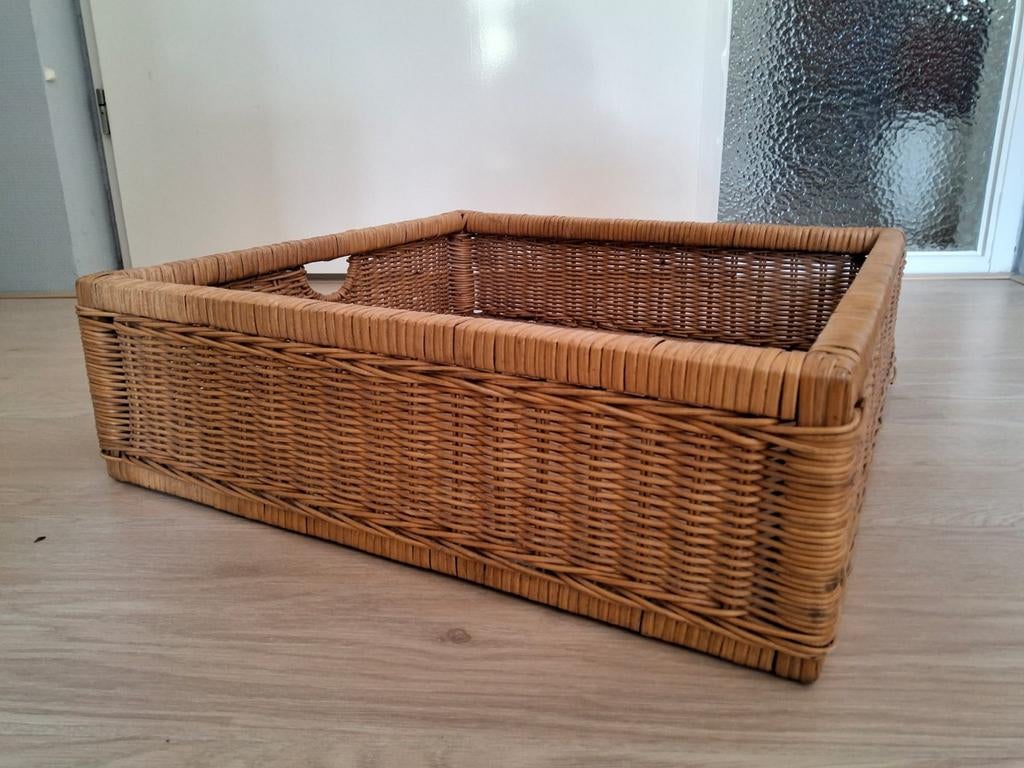 Rieten mand/lectuurbak, Ophalen