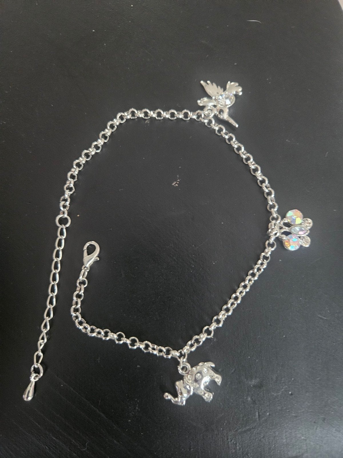 Zilverkleurige enkelband met bedels, Overige materialen, Met bedels of kralen, Nieuw, Ophalen of Verzenden