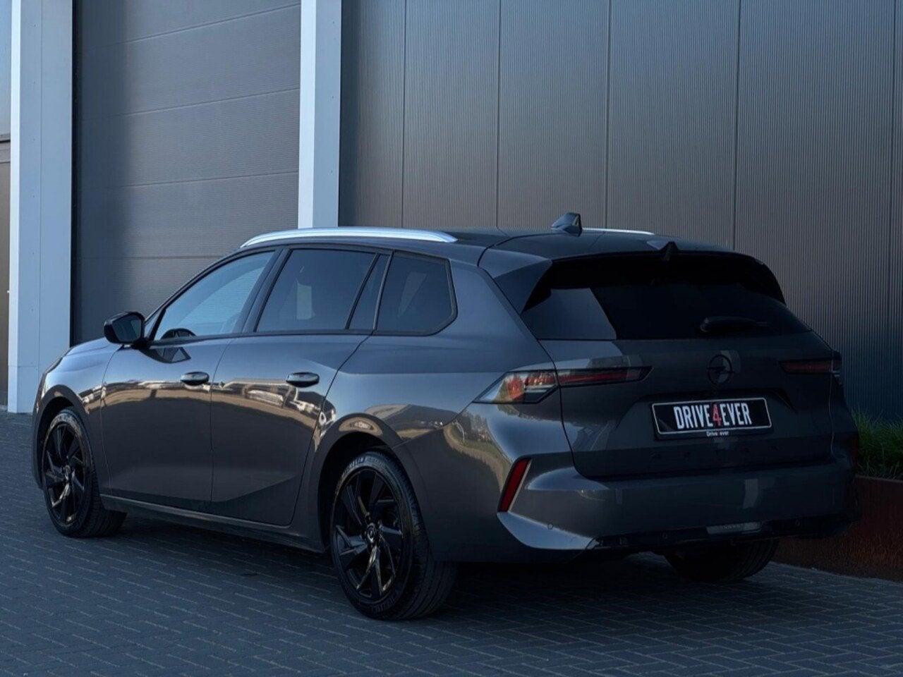 Opel Astra Sports Tourer, Auto's, Opel, Automaat, Dealer onderhouden, Gebruikt, Zwart