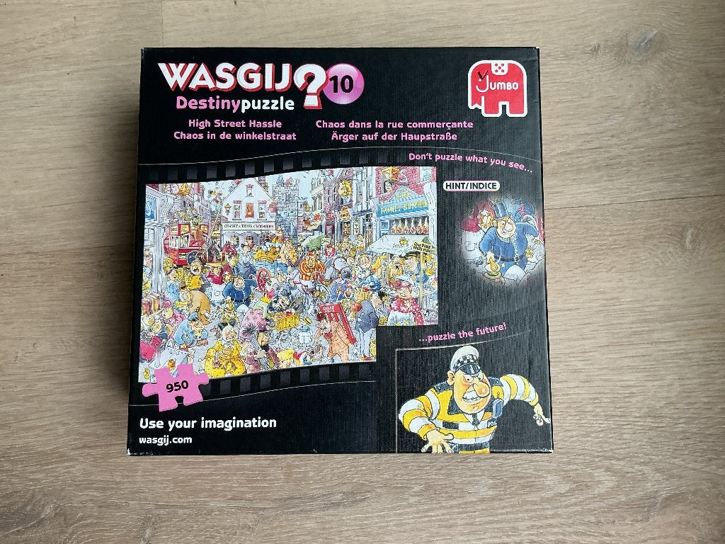 Wasgij legpuzzel CHAOS IN DE WINKELSTRAAT 950 st, Hobby en Vrije tijd, Ophalen, 500 t/m 1500 stukjes, Zo goed als nieuw, Legpuzzel