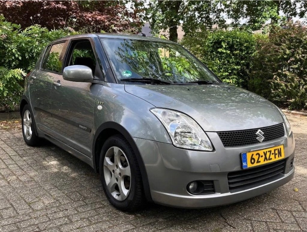 Suzuki Swift 1.5 5D AUT 2005 Grijs KEYLESS ENTRY, Auto's, Suzuki, Euro 5, Stof, Zwart, 4 cilinders