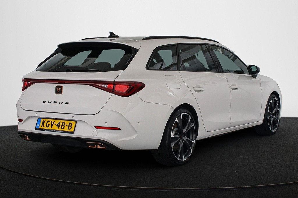 CUPRA Leon Sportstourer 1.4 e-Hybrid VZ 245 PK Achteruitrijc, Auto's, Cupra, Stof, Gebruikt, 4 cilinders, Leon