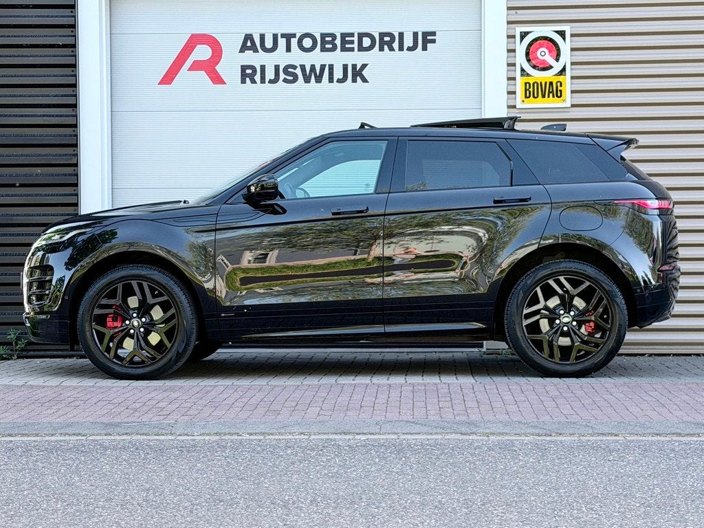 Land Rover Range Rover Evoque 1.5 P300e AWD Autobiography Pa, Auto's, Land Rover, 12 maanden, Euro 6, Zwart, Bedrijf