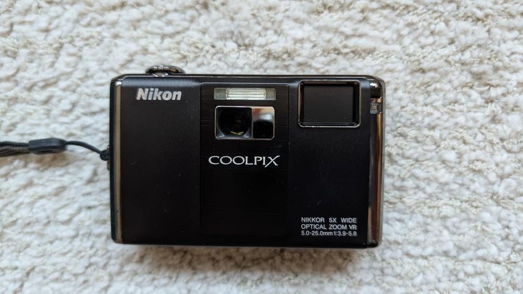 Nikon Coolpix S1000pj compactcamera met projector, Gebruikt, Compact, Ophalen of Verzenden, 4 t/m 7 keer