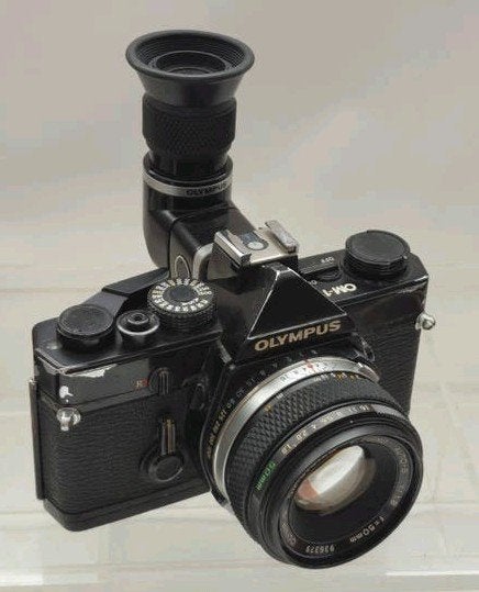Olympus OM 1 met 50 en hoekzoeker, Ophalen of Verzenden, Gebruikt, Spiegelreflex, Olympus