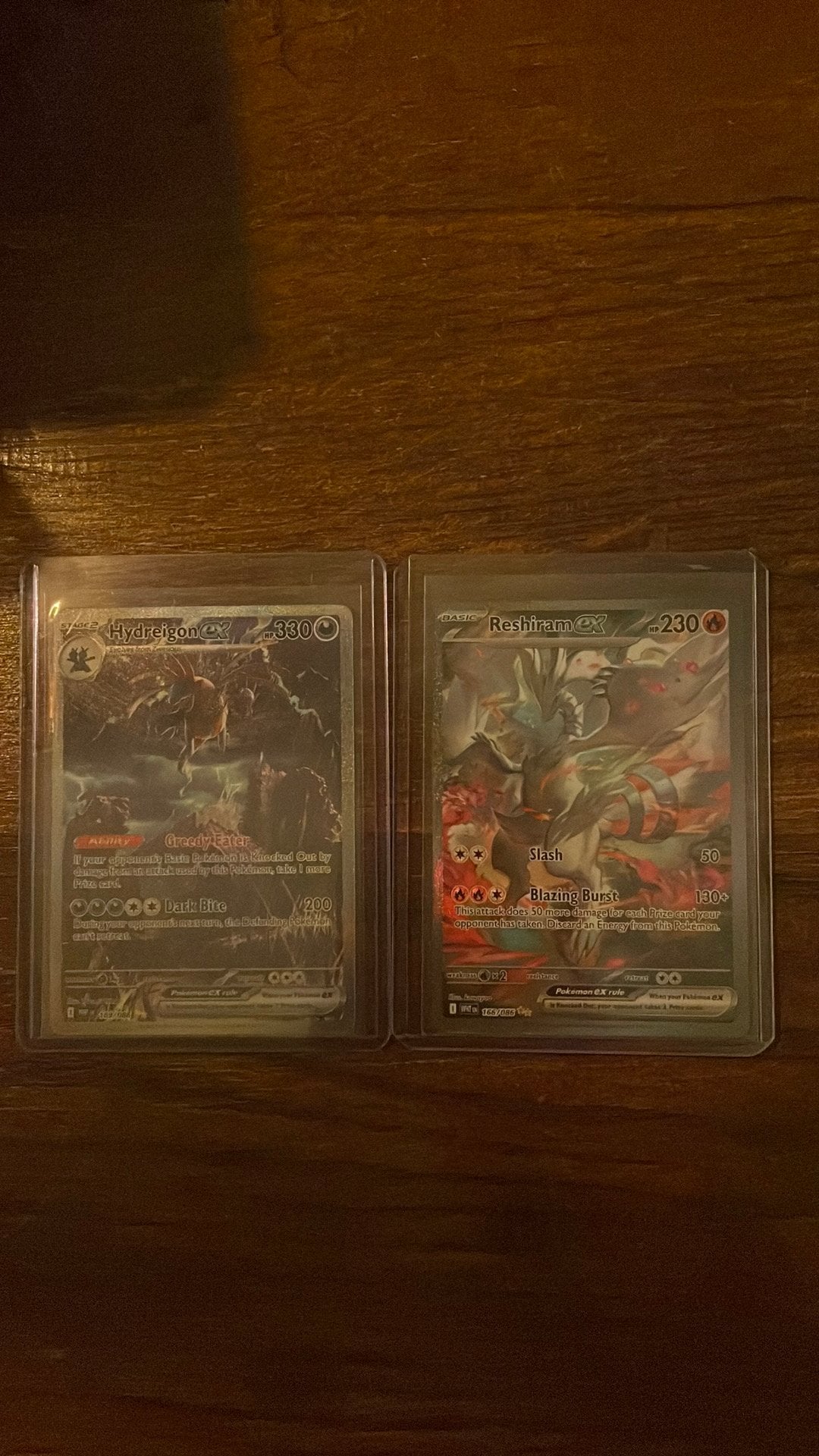 Reshiram ex 166/086 en Hydreigon 169/086 beiden NM, Ophalen, Zo goed als nieuw, Meerdere kaarten, Foil