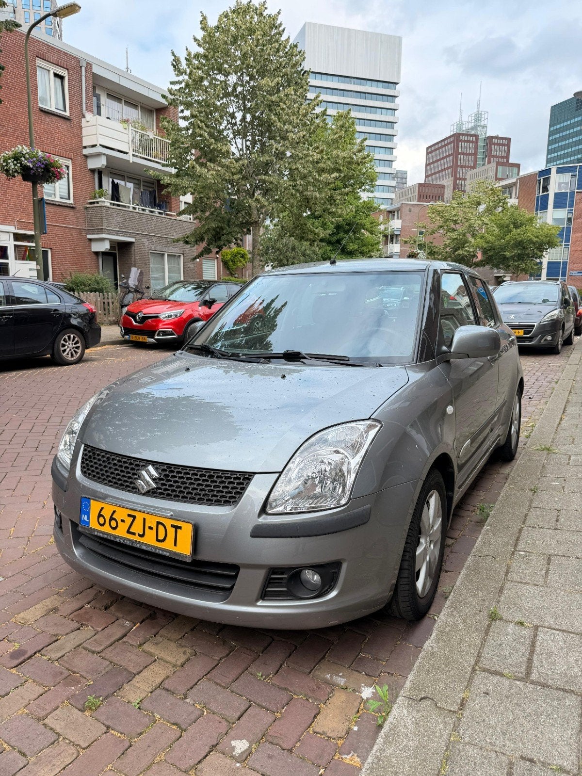 Suzuki Swift 1.3 5D AUT 2008 Grijs, Auto's, Stof, 40 €/maand, Zwart, 400 kg