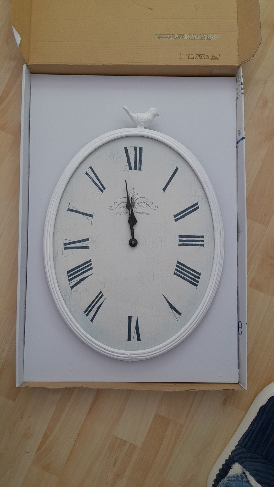 Ovale wandklok met vogeltje, Ophalen of Verzenden, Zo goed als nieuw, Wandklok