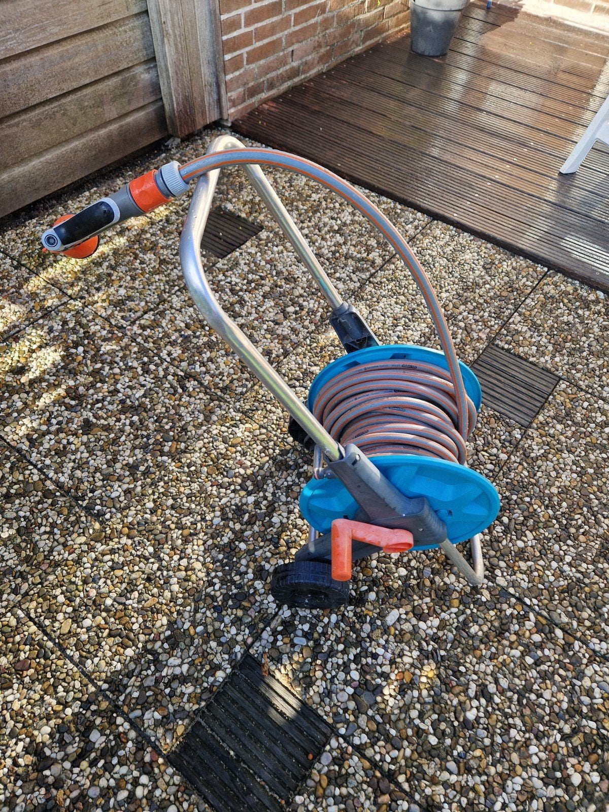 Gardena Tuinslanghaspel met slang en spuitstuk, Tuin en Terras, Ophalen, Gebruikt, Tuinslanghaspel