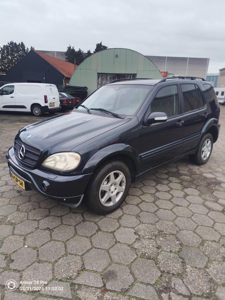 Mercedes ML AMG uitgevoerd facelift 2003, Auto's, Mercedes-Benz, Automaat, Zwart, 3500 cc, Navigatiesysteem