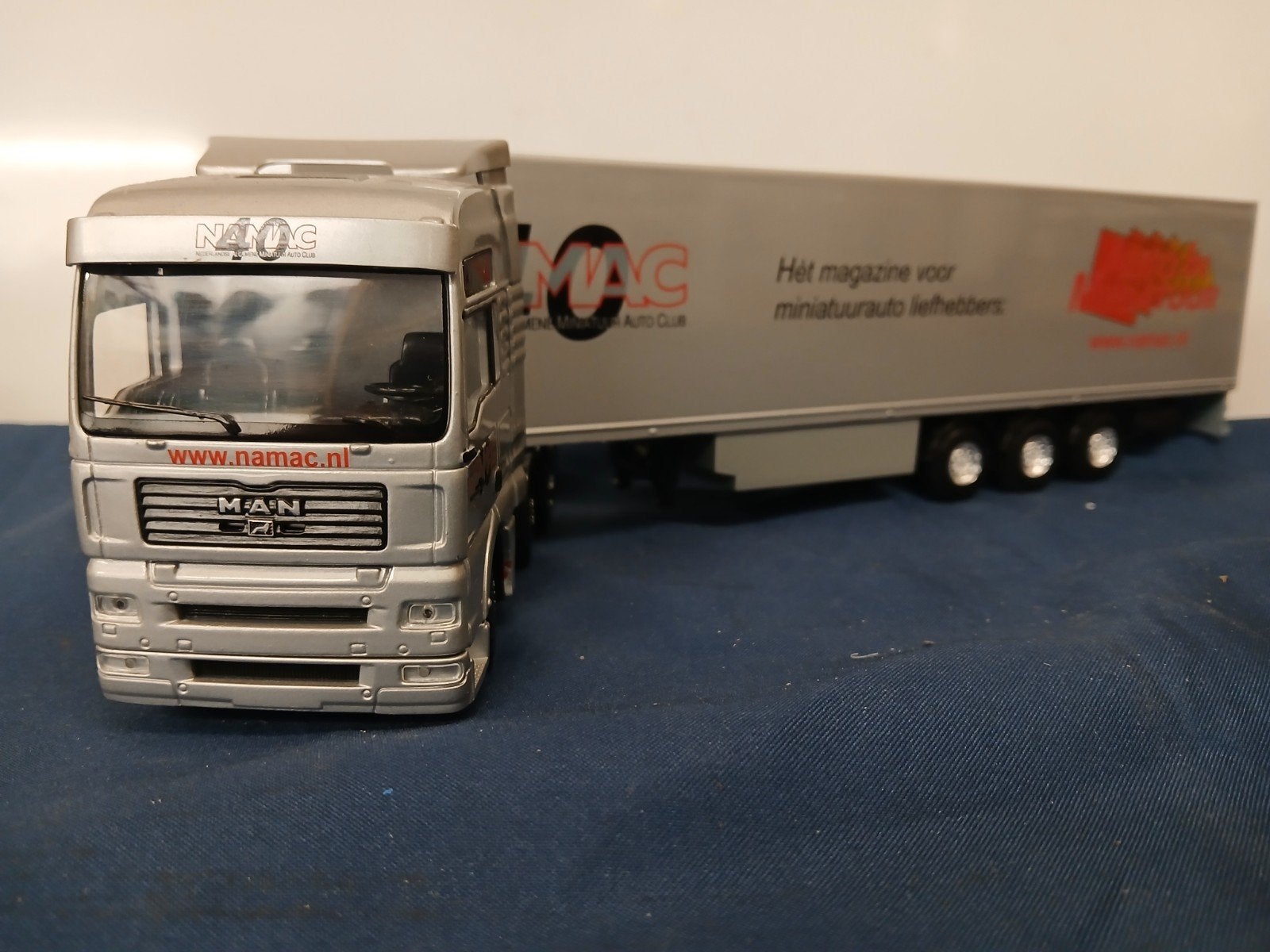 Lion Toys M A N. met voorloopas, Hobby en Vrije tijd, Modelauto's | 1:50, Ophalen, Zo goed als nieuw, Bus of Vrachtwagen, Lion Toys