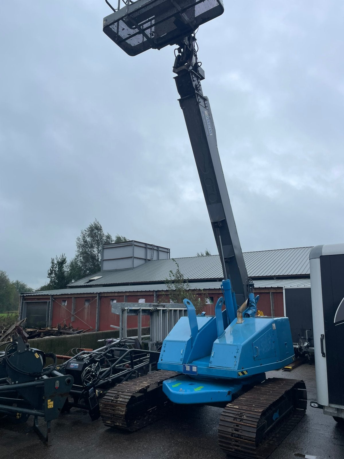 Aichi sr12b rups telescoop hoogwerker, Ophalen