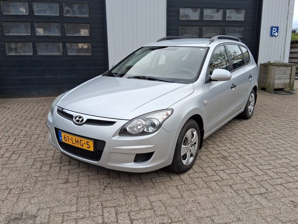 Hyundai I30 CW 1.4i Blue Active trekhaak airco (bj 2010), Auto's, Voorwielaandrijving, Stof, Gebruikt, 4 cilinders