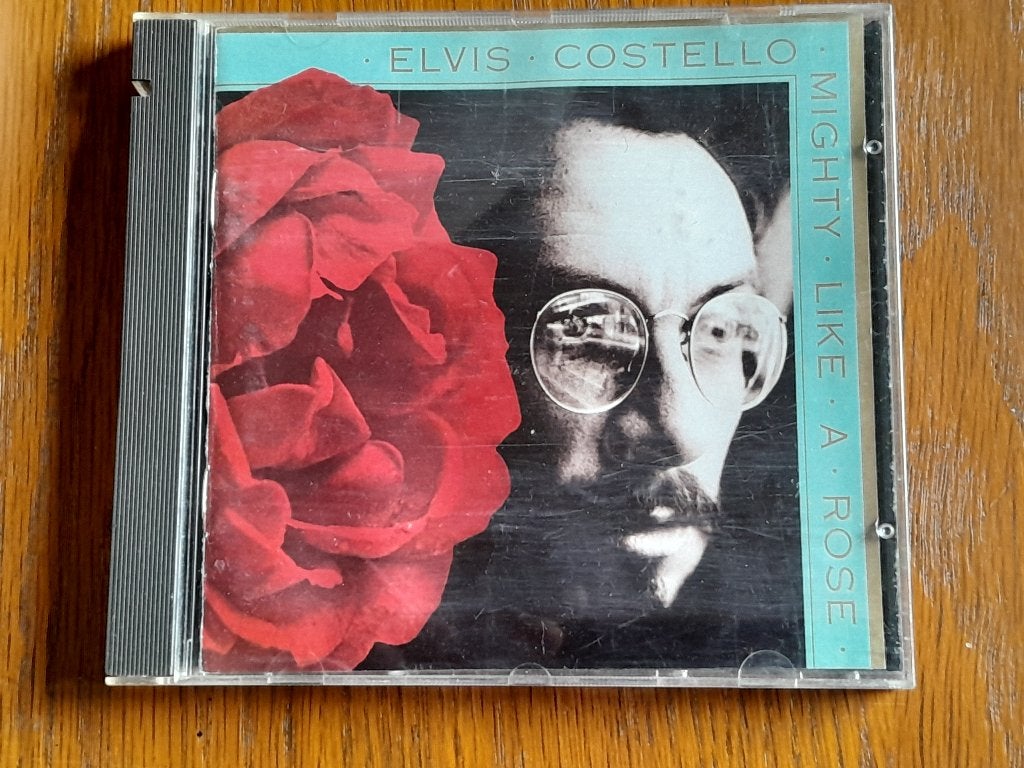 Elvis Costello mighty like a rose cd, Ophalen of Verzenden, Gebruikt