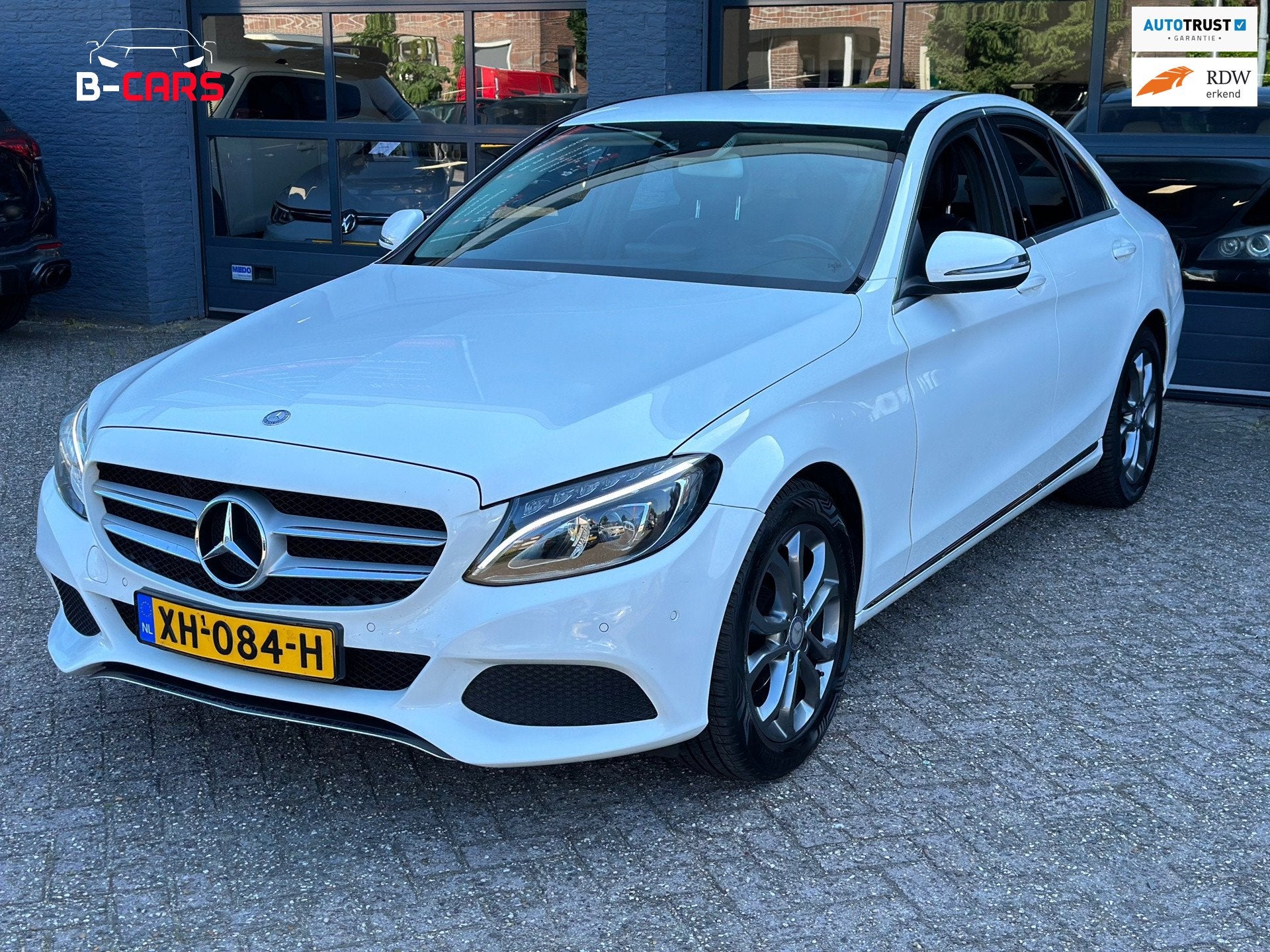 Mercedes-Benz C-klasse 180 AmbiL|Xenon|Leer|Camera|Pdc|Nap!, Automaat, Euro 6, Wit, Bedrijf