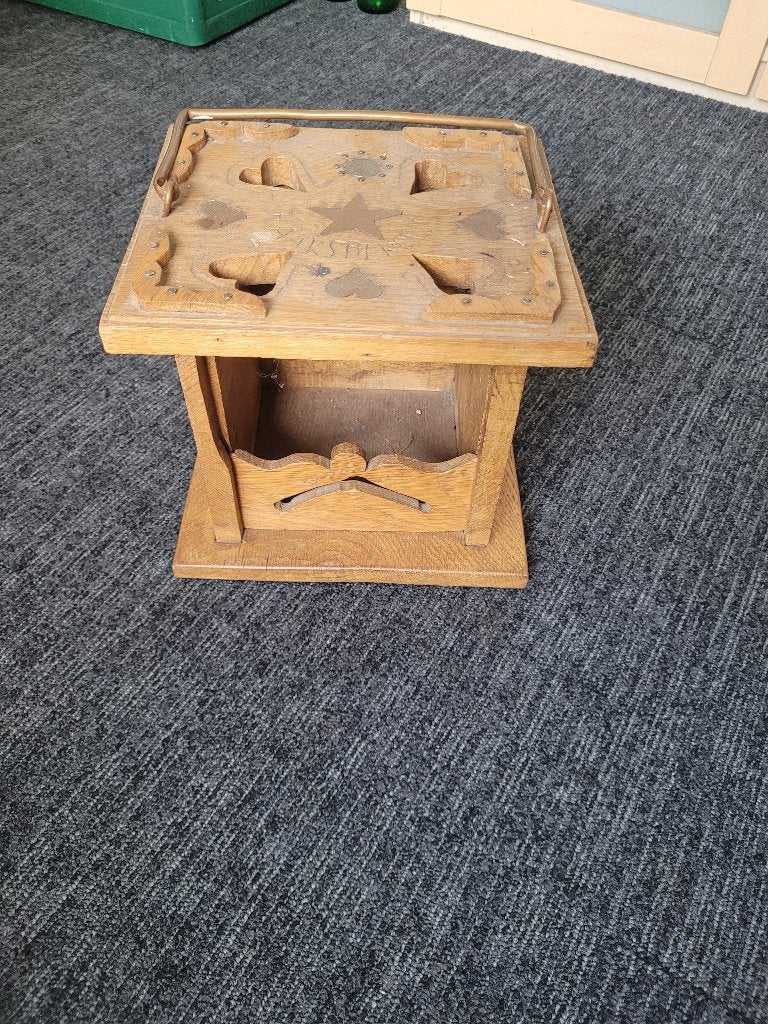 Houten voetenstoof, Ophalen