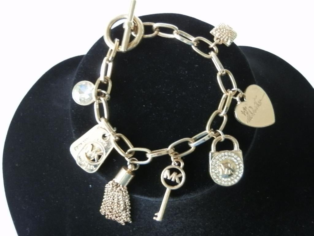Michael Kors armband., Sieraden, Tassen en Uiterlijk, Armbanden, Ophalen of Verzenden, Zo goed als nieuw, Overige kleuren, Overige materialen