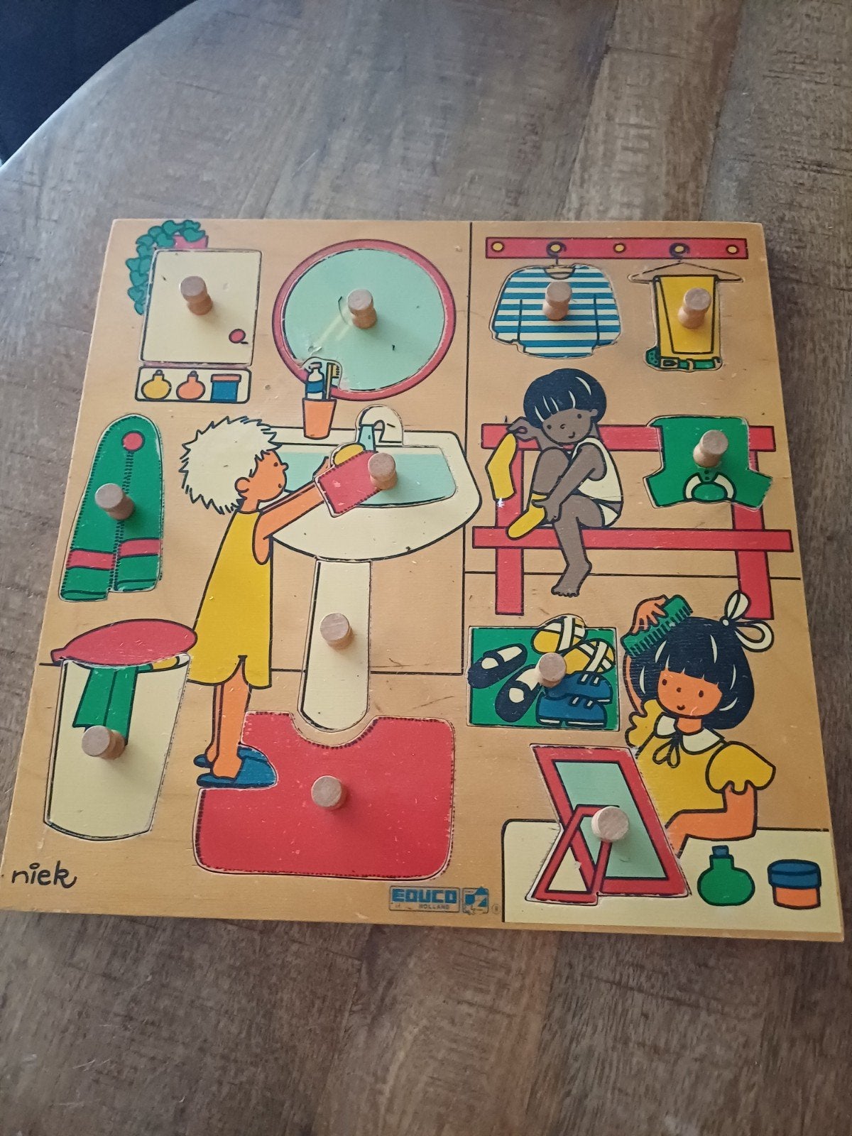 Houten Educo Puzzel: Dagelijkse Handelingen, Ophalen, 2 tot 4 jaar, Gebruikt, 10 tot 50 stukjes