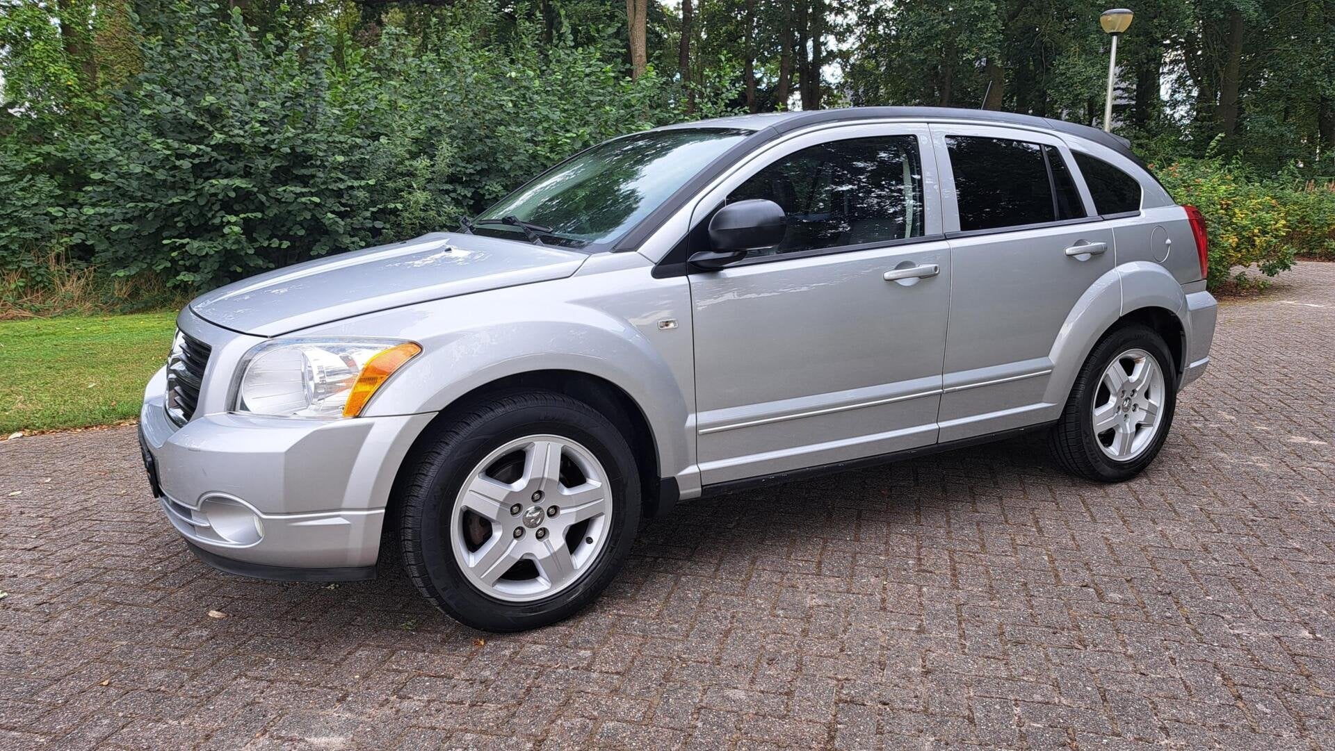 Dodge Caliber 2.0 SXT AUT. CRUISE ELEK.RAMEN AIRCO HOGE ZIT, Auto's, 1998 cc, 450 kg, Gebruikt, Zwart