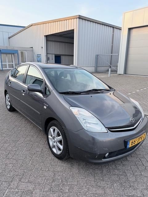Toyota Prius 1.5 HSD 2009 Grijs, Auto's, 1497 cc, 4 cilinders, 23 km/l, Origineel Nederlands
