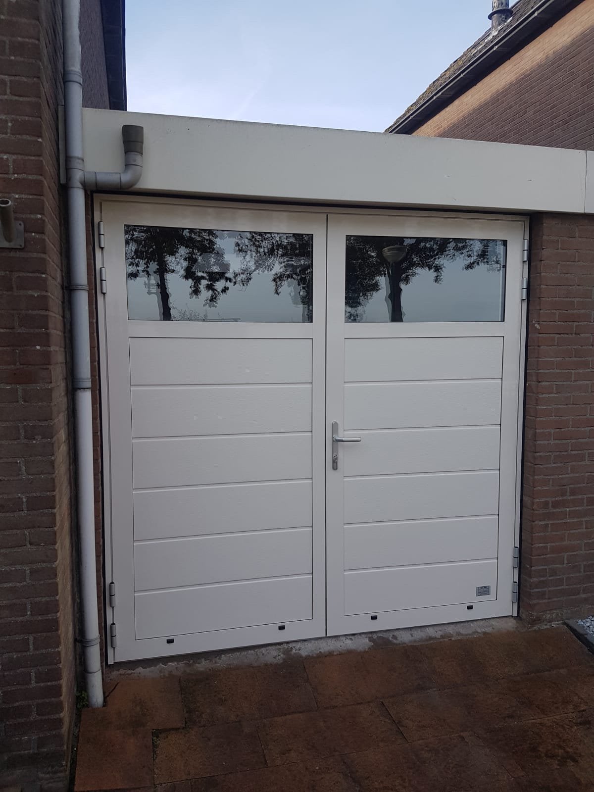 Luxe line twin openslaande geisoleerde garagedeur, Ophalen, Zo goed als nieuw, 150 tot 200 cm, Hout