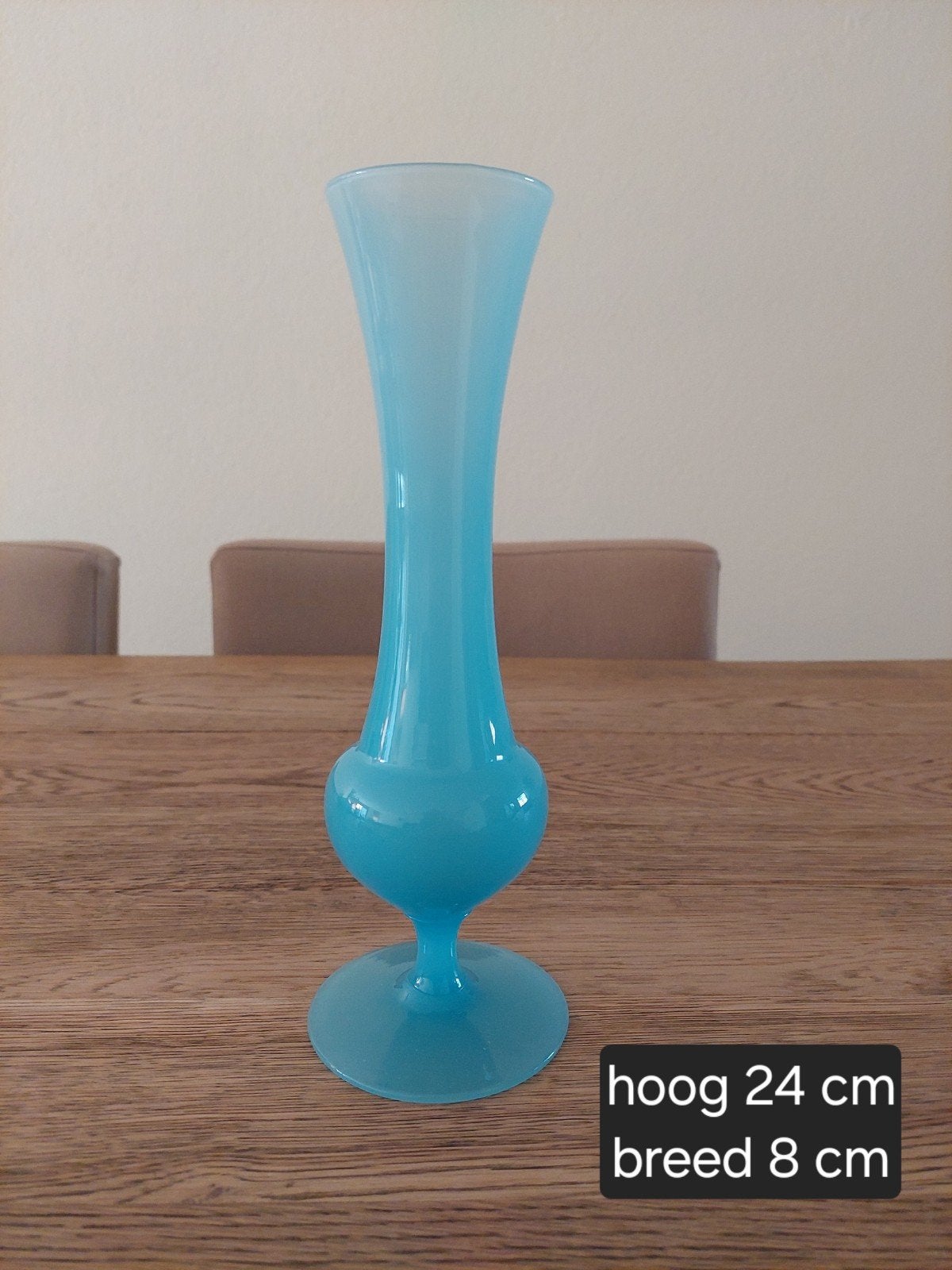 Opaline blauwe vaas, Ophalen