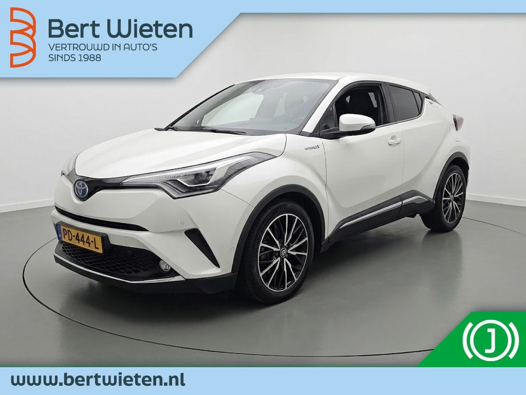 Toyota C-HR 1.8 Hybrid Premium | Geen import | Trekhaak | JB, Auto's, Automaat, 4 cilinders, Leder en Stof, Wit