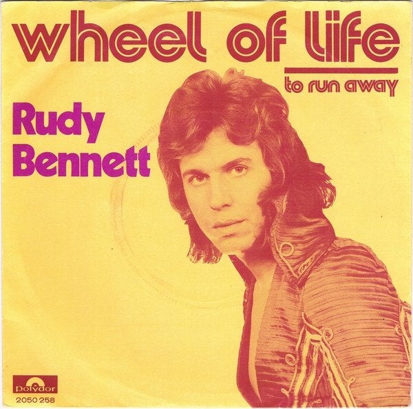 Rock Single (1973) Rudy Bennett - Wheel of Life, Fotohoes, Ophalen of Verzenden, Gebruikt, Pop