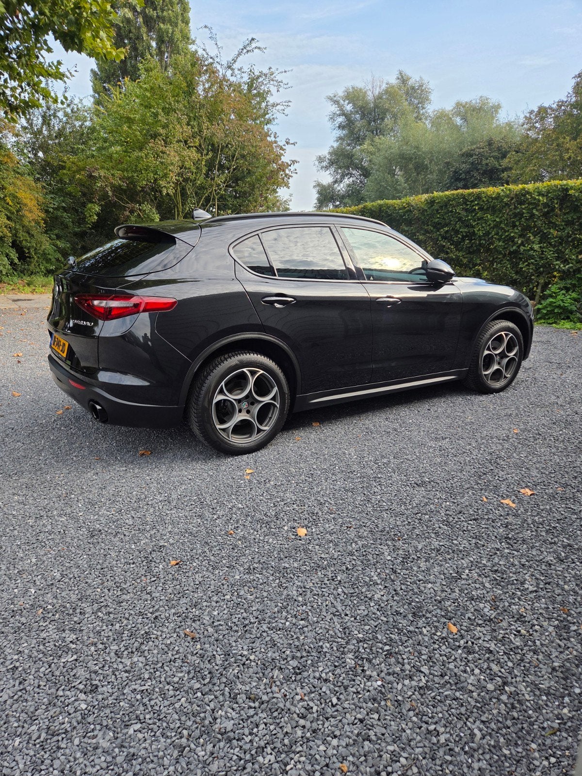 Alfa Romeo Stelvio 2.0 202PK AT AWD 2018 Zwart, Auto's, Automaat, 1995 cc, 2000 kg, Zwart
