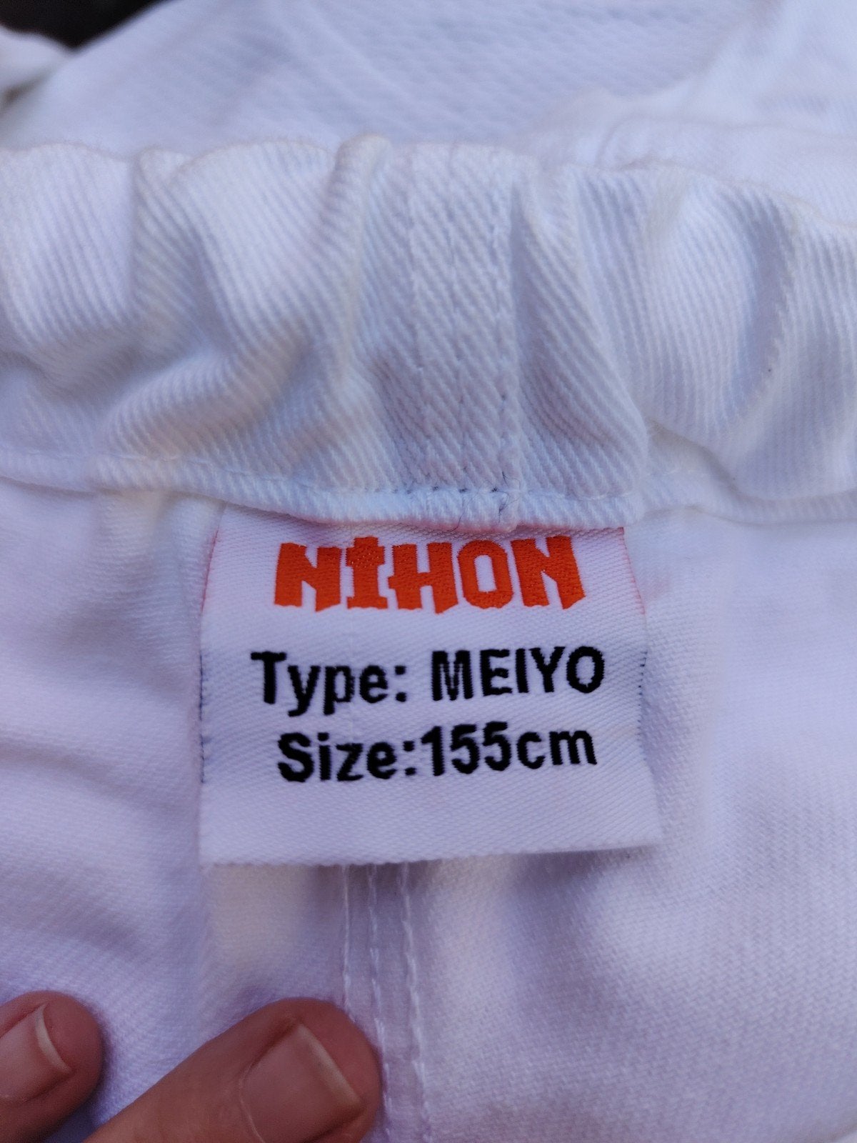Judo pak Nihon Meiyo 155cm met gele band, Ophalen, Zo goed als nieuw, Judo, Vechtsportpak