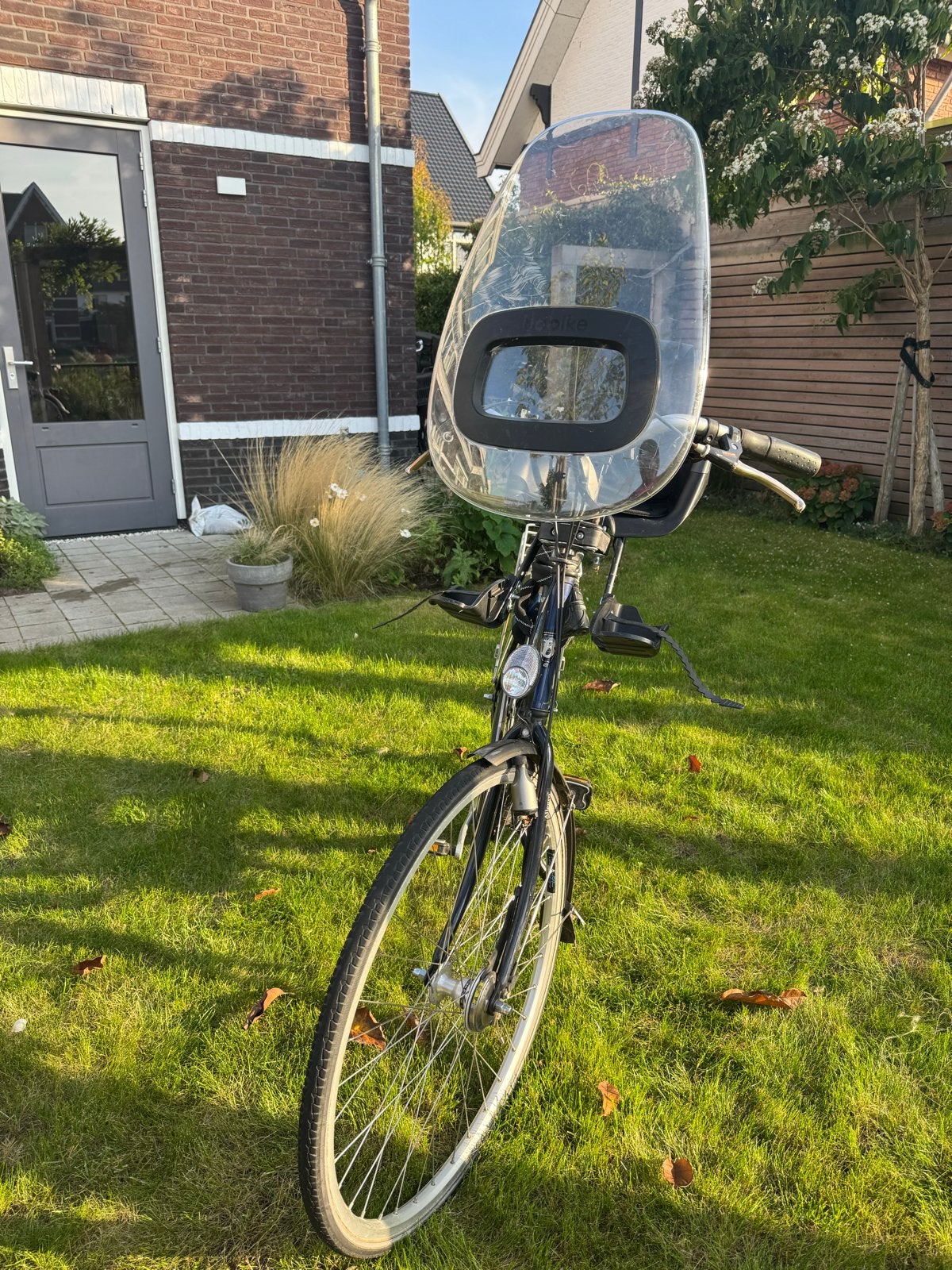 Foto 4 van Batavus fiets met Bobike kinderzitje en windscherm