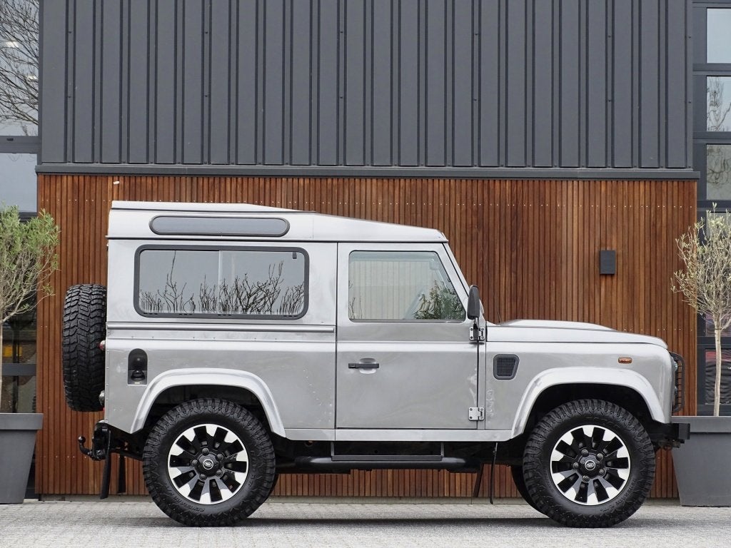 Land Rover Defender 2.4 TD4 HT 90" SE / Recaro / grijs kente, Auto's, Euro 5, Gebruikt, Zwart, Origineel Nederlands