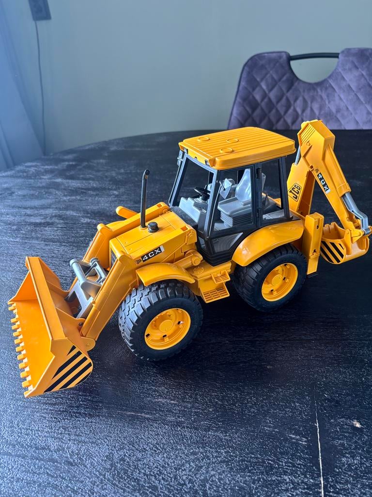 Bruder tractor met shovel en graafarm., Ophalen, Zo goed als nieuw, Tractor of Landbouw, Overige merken