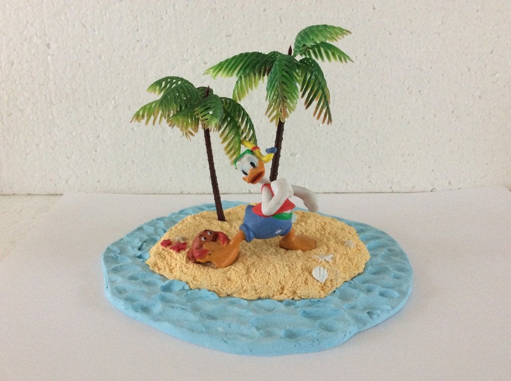 Disney Donald Duck - beeld - eiland, Verzamelen, Ophalen of Verzenden, Donald Duck, Zo goed als nieuw, Beeldje of Figuurtje