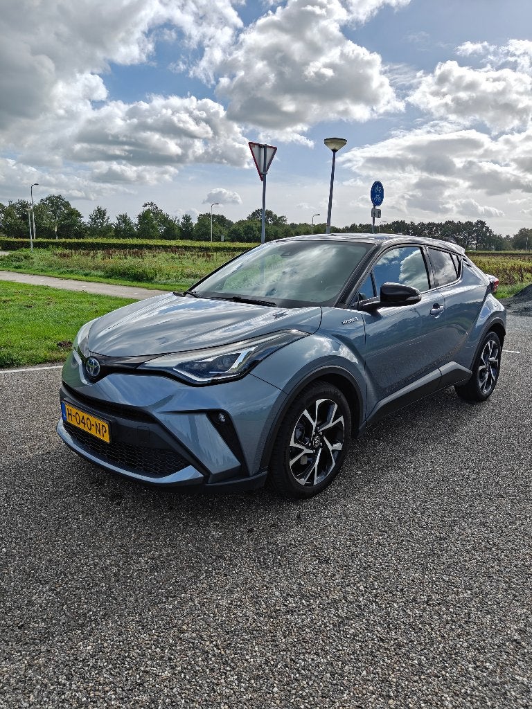 Toyota C-HR 1.8 Hybrid 122pk CVT 2020 Grijs, Auto's, Stof, 725 kg, 4 cilinders, 75 €/maand