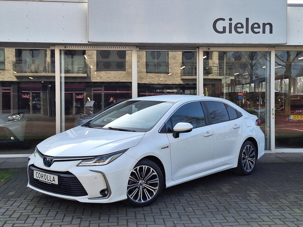 TOYOTA Corolla Sedan 1.8 Hybrid Style | Parkeersensoren, Nav, 12 maanden, Gebruikt, 4 cilinders, Corolla