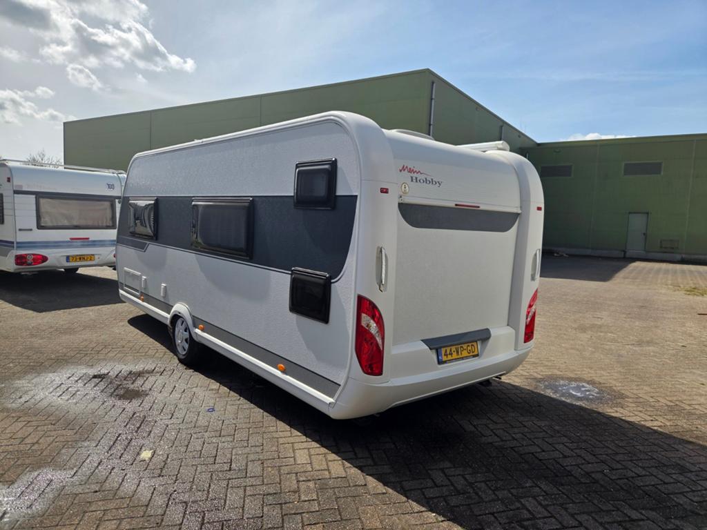 Hobby 540 KMFE - Perfecte gezinscaravan met airco & mover, Hobby, Airco, Treinzit, Particulier