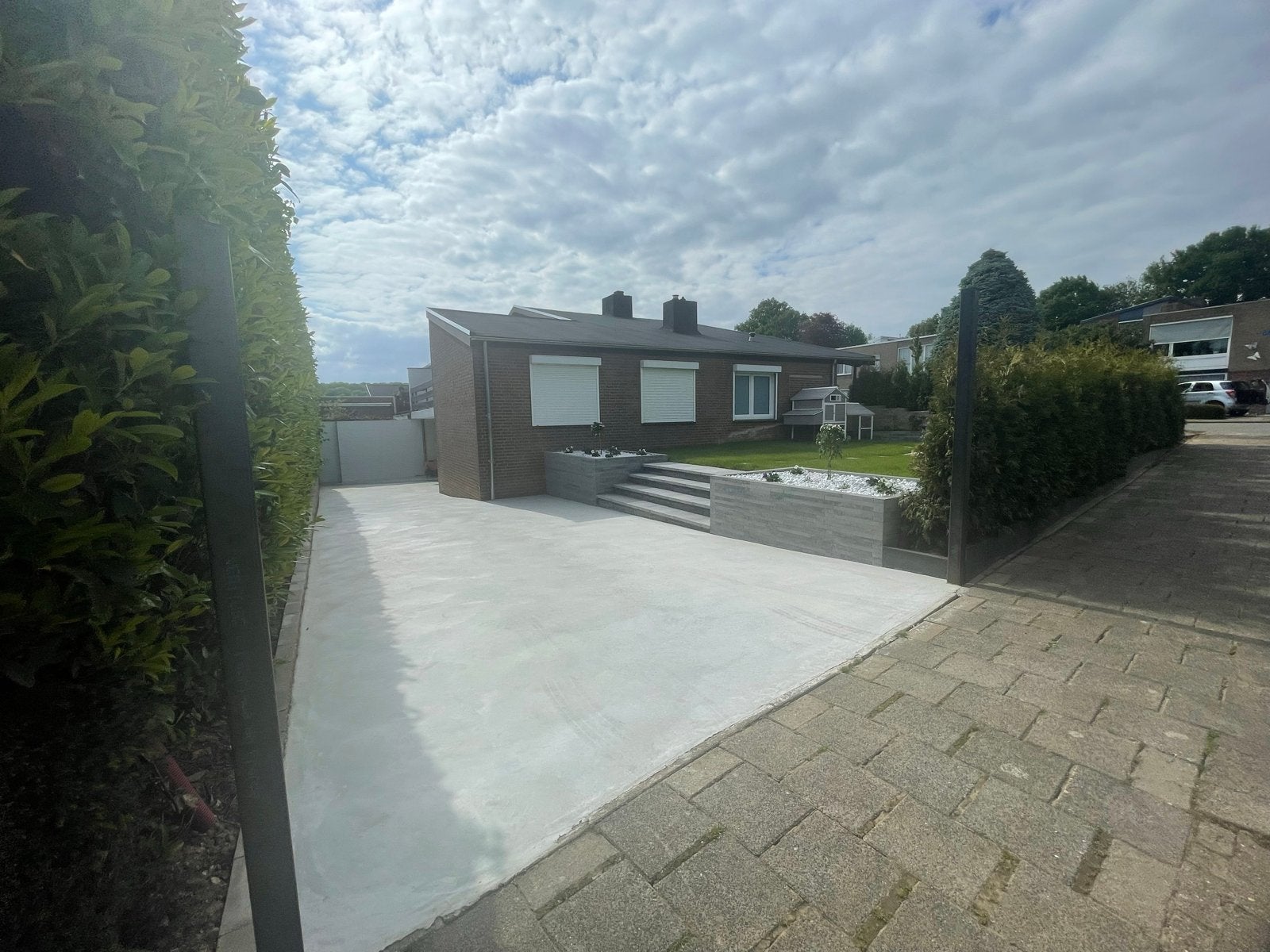 Tuinaanleg, bestrating, gras, beton, keerwanden, grondwerk, Ophalen