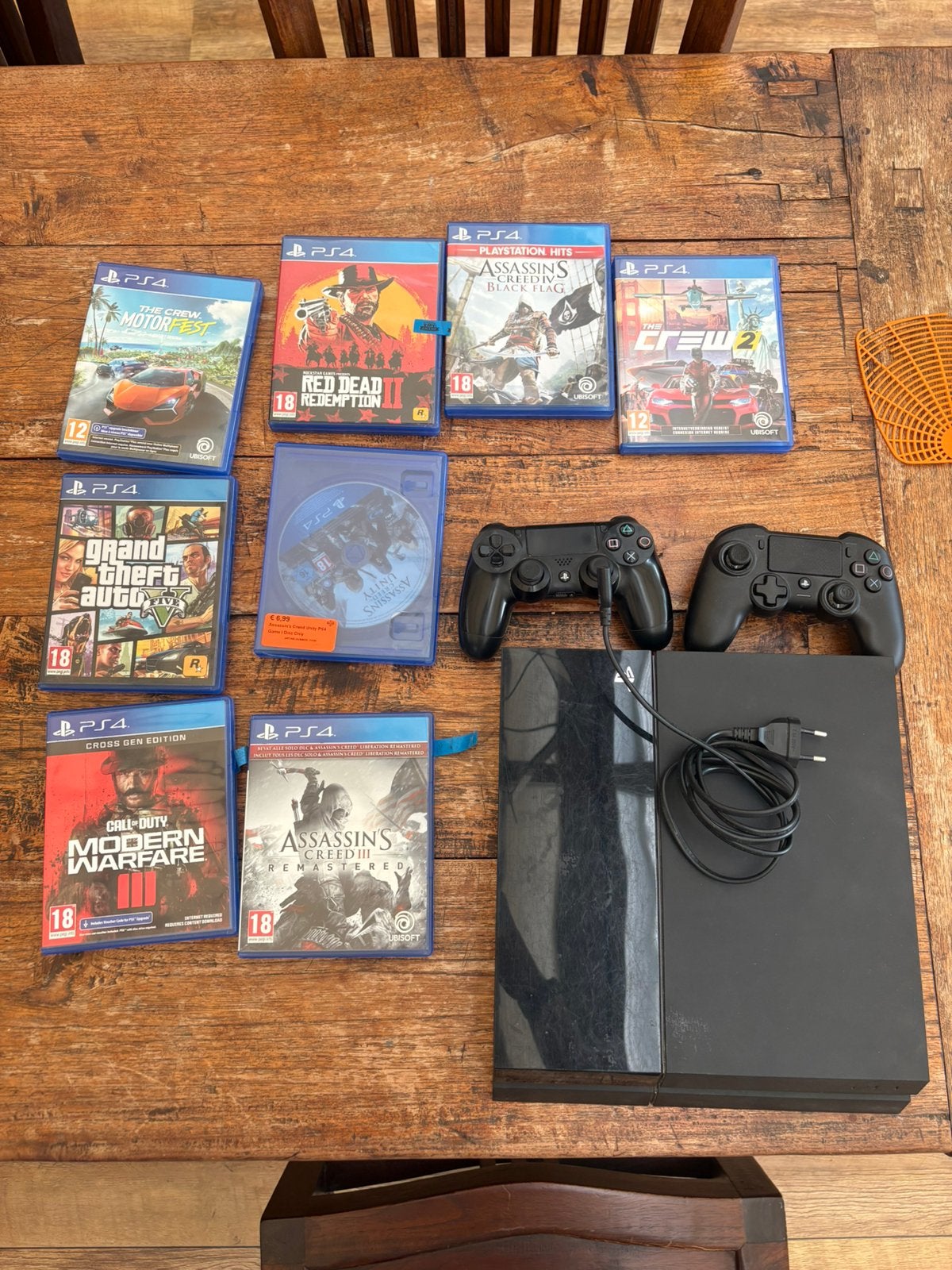PlayStation 4 + 2 controllers + 8 games, Met 2 controllers, Ophalen of Verzenden, Zo goed als nieuw, Slim