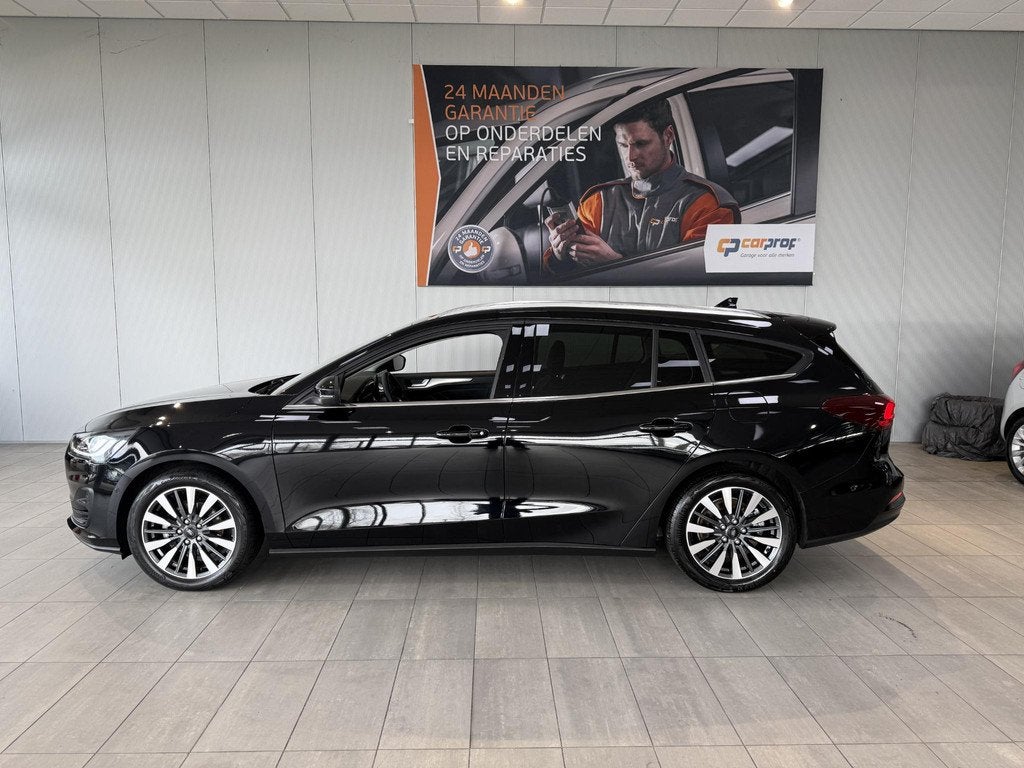 Ford Focus Wagon 1.0 EcoBoost Hybrid 155PK Automaat Titanium, Gebruikt, Euro 6, Automatische klimaatregeling, Zwart