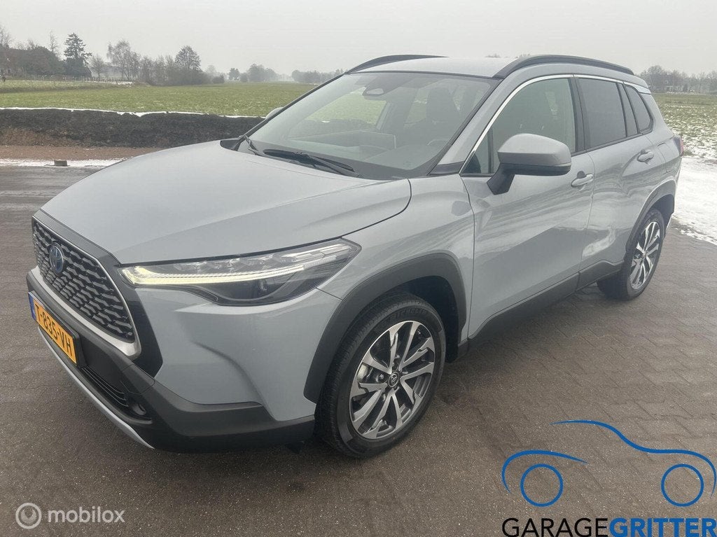 Toyota Corolla Cross Hybrid 140 Dynamic, Auto's, Gebruikt, 4 cilinders, Hybride Elektrisch/Benzine, Te koop