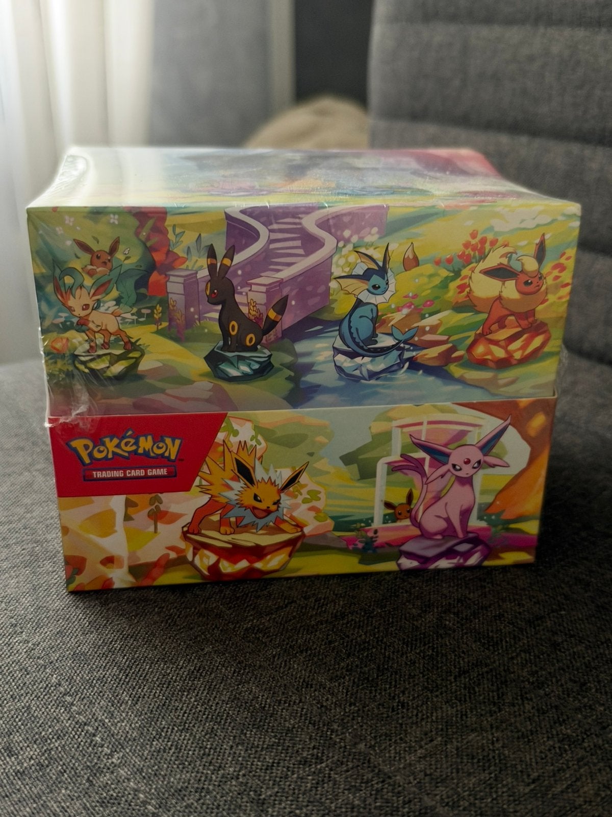 Pokemon prismatic evolutions mini tin display, Ophalen of Verzenden, Zo goed als nieuw