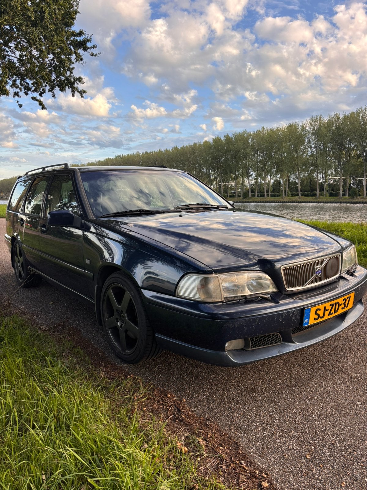 Volvo V70 2.3 R AUT 1997 Blauw, Auto's, Zwart, Blauw, Stationwagon, Particulier