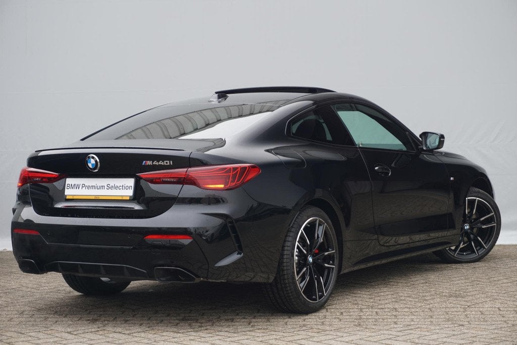 BMW 4 Serie Coupé M440i xDrive M Sport Pro | Schuif-/kantel, Auto's, BMW, 1800 kg, 4-Serie, Met garantie (alle), 4 stoelen