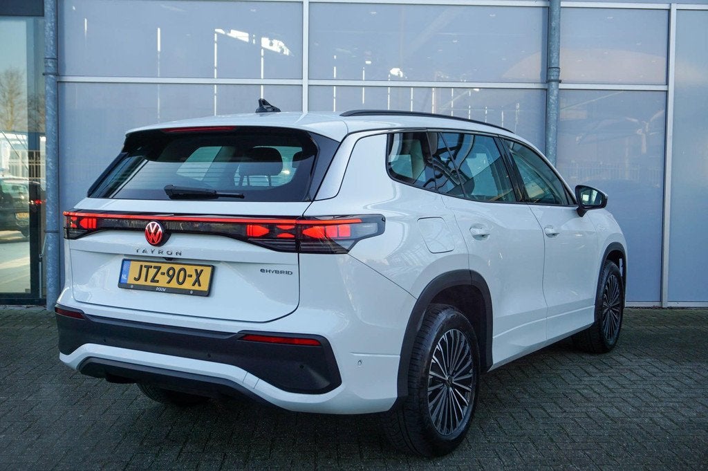 Volkswagen Tayron 1.5 eHybrid 204pk Life Edition | Trekhaak, Auto's, Volkswagen, 12 maanden, Stof, 4 cilinders, 150 min