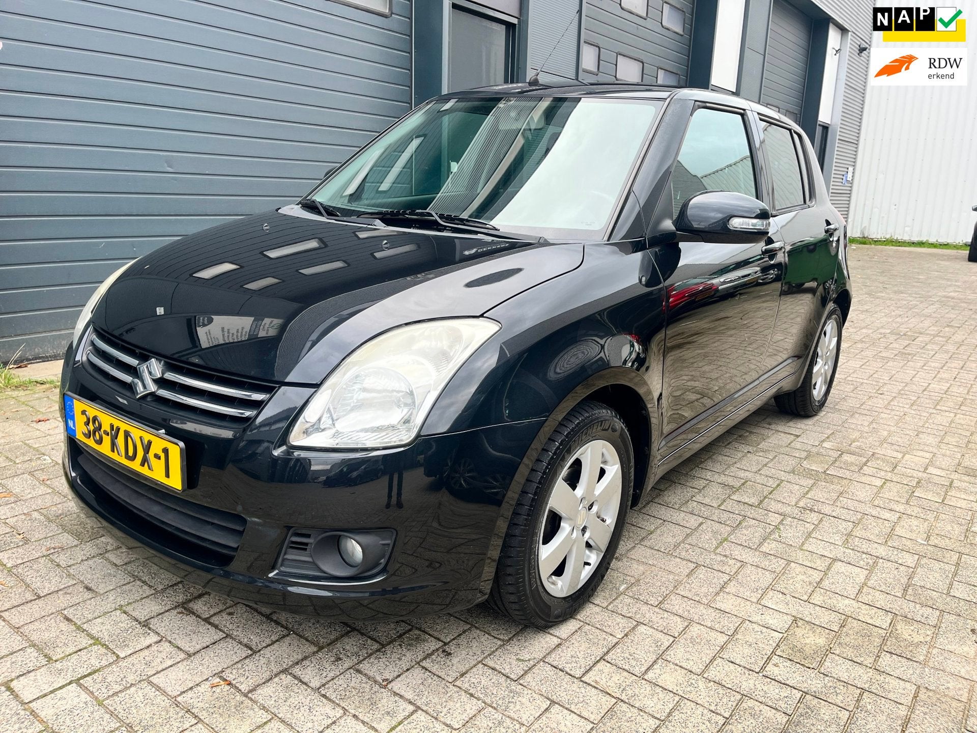 Suzuki Swift 1.3 Limited - lage km stand - 1e eigenaar, Auto's, Voorwielaandrijving, Zwart, 400 kg, Alcantara
