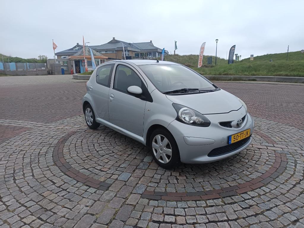 Toyota Aygo 1.0 12V Vvt-i 5DRS 2007 Grijs, Auto's, Voorwielaandrijving, Euro 5, Stof, Zwart